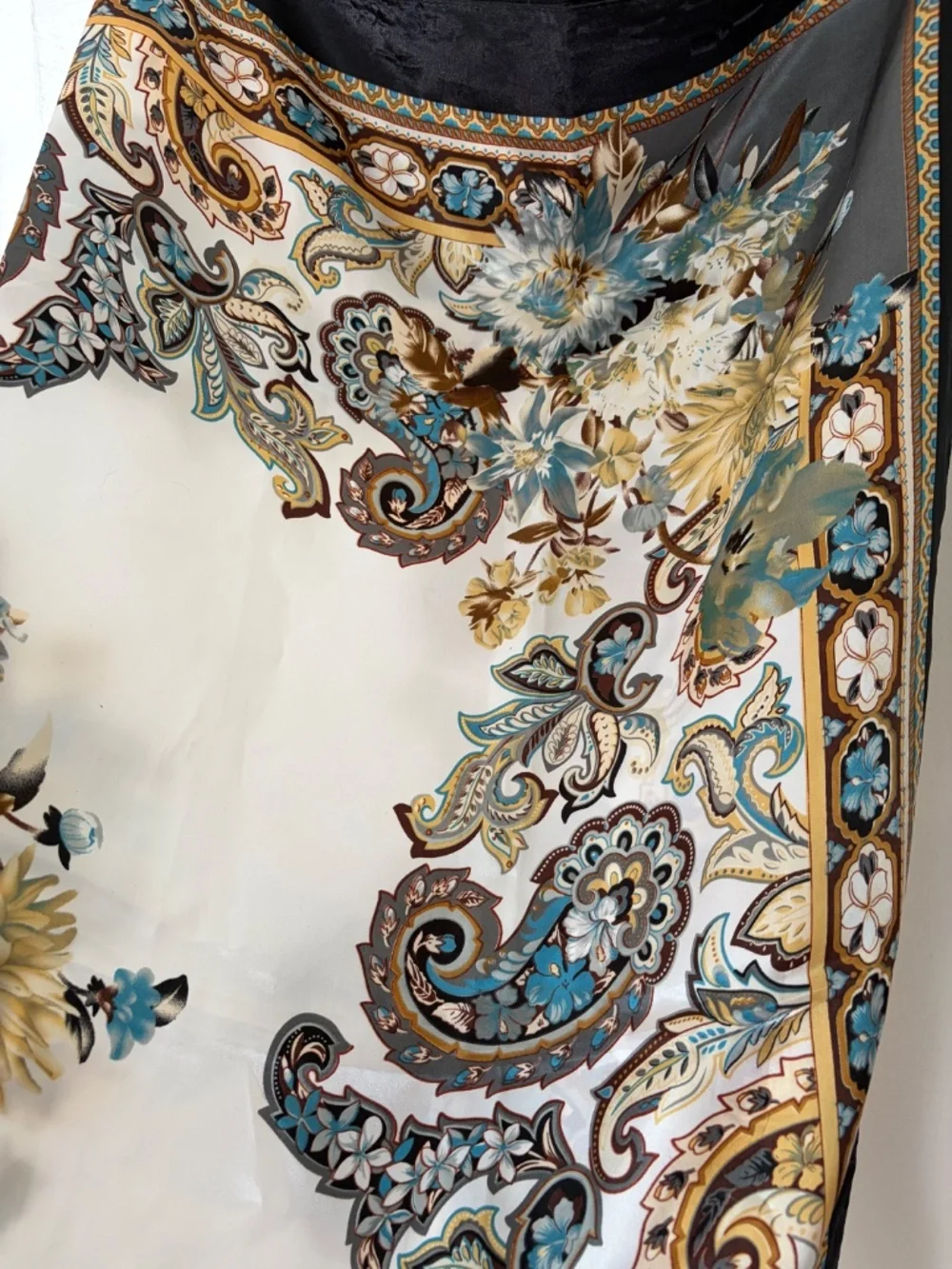 Beautiful scarf in white, blue, brown, and black
